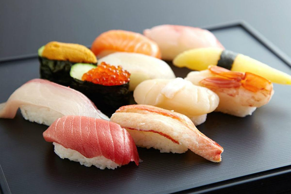 Shinmei Sanchi Gensen onigiri held in hand showing shape-holding benefit