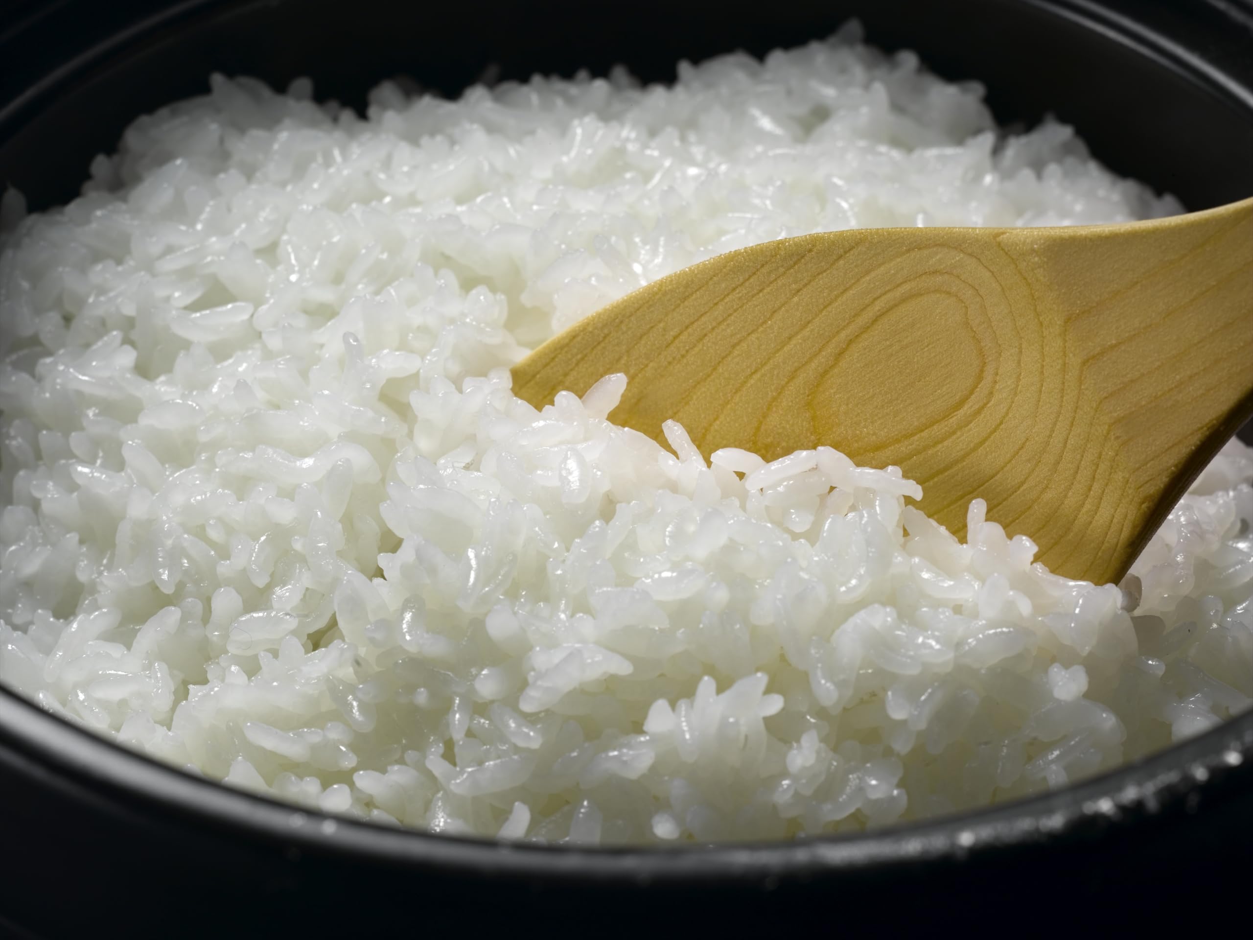 新之助 新潟 cooked rice in a bowl with separated grains, illustrating ideal fluffiness