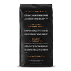 Close-up of Shock coffee grounds texture highlighting rich Arabica roast and aroma