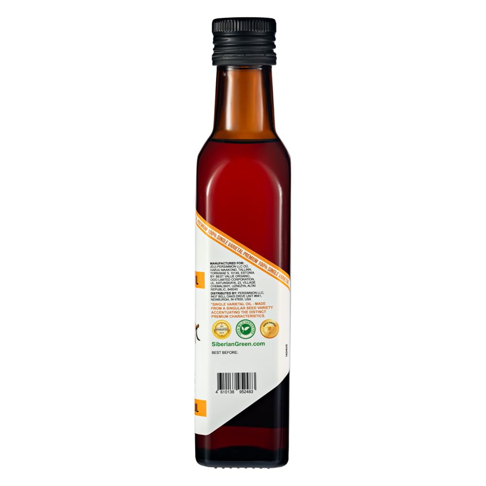 Siberian Green oil in jar displaying vivid orange color and freshness benefit