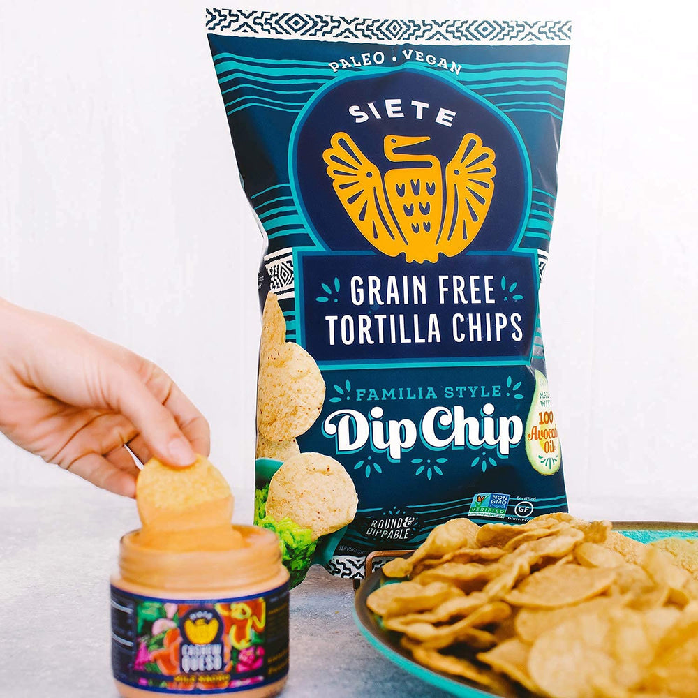siete chips with guacamole on party plate, brand enhances sharing moments