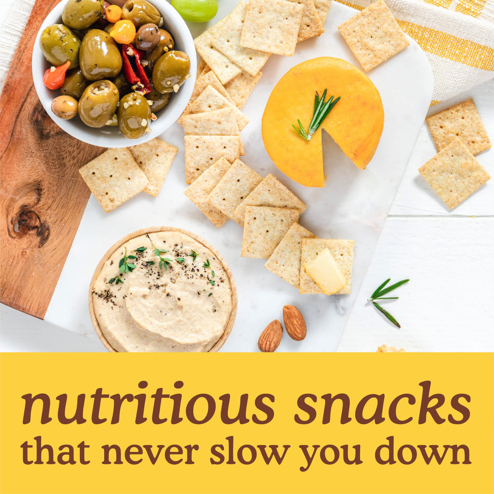 Simple Mills crackers arranged with hummus showing brand suitability for dips and entertaining