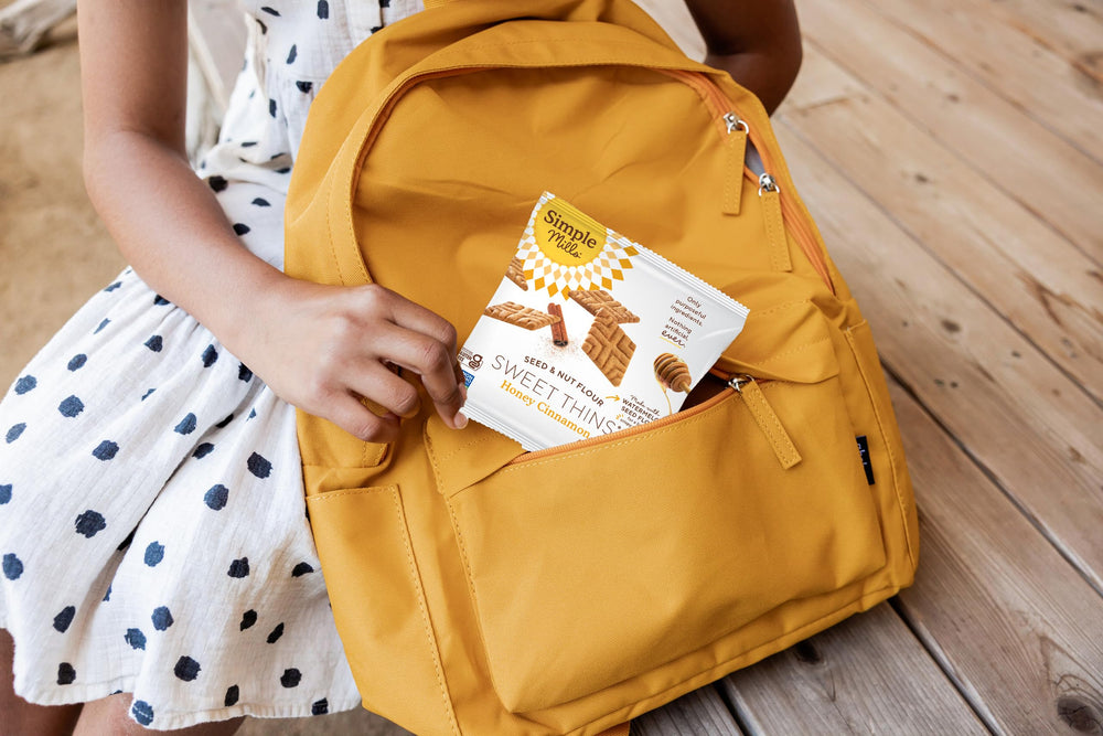 Simple Mills snack pack inside a lunchbox showing everyday portability and quick snack option
