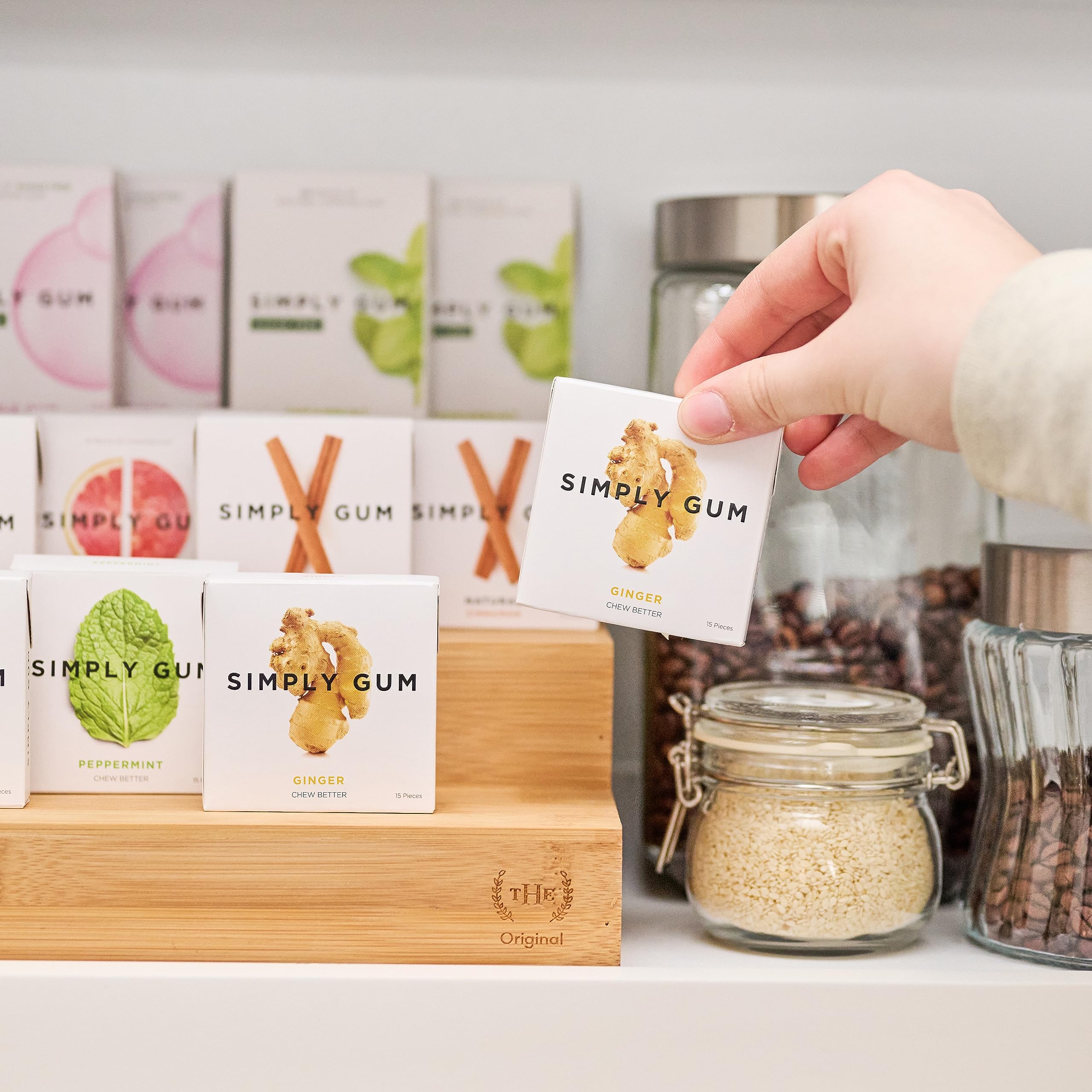 Simply Gum ginger piece in hand illustrating on-the-go convenience and freshness