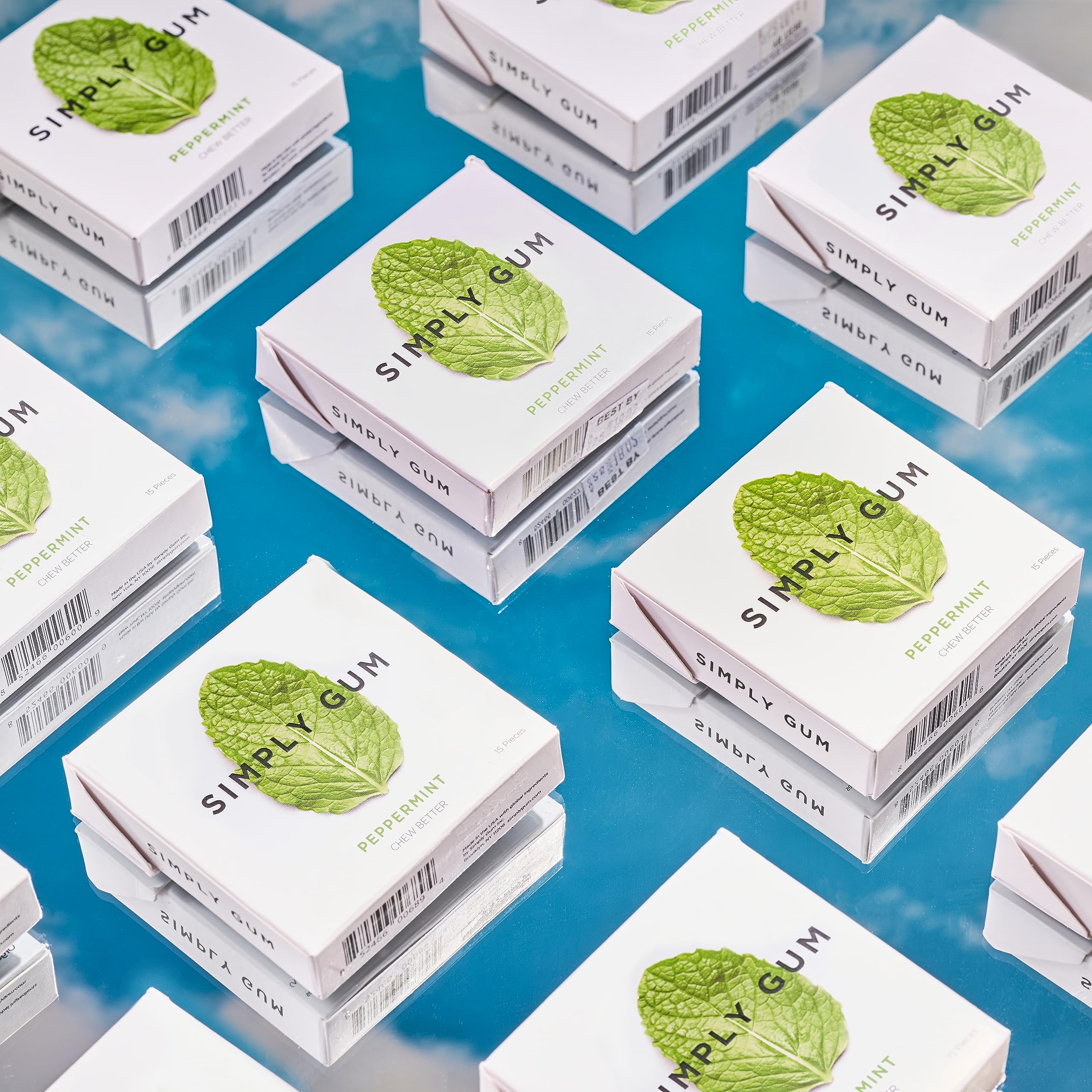 Simply Gum peppermint hand stacked pieces illustrating chew shape and convenience