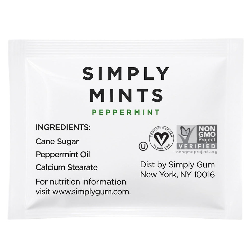 Simply Gum packet in a hand next to keys to show pocket-sized convenience and travel benefit