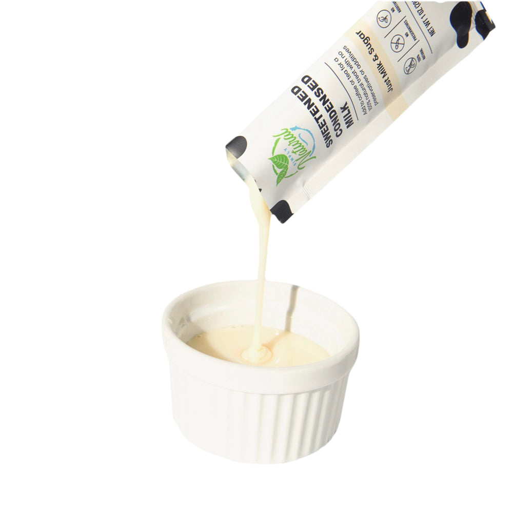 Simply Natural poured condensed milk texture demonstrating creamy consistency for recipes