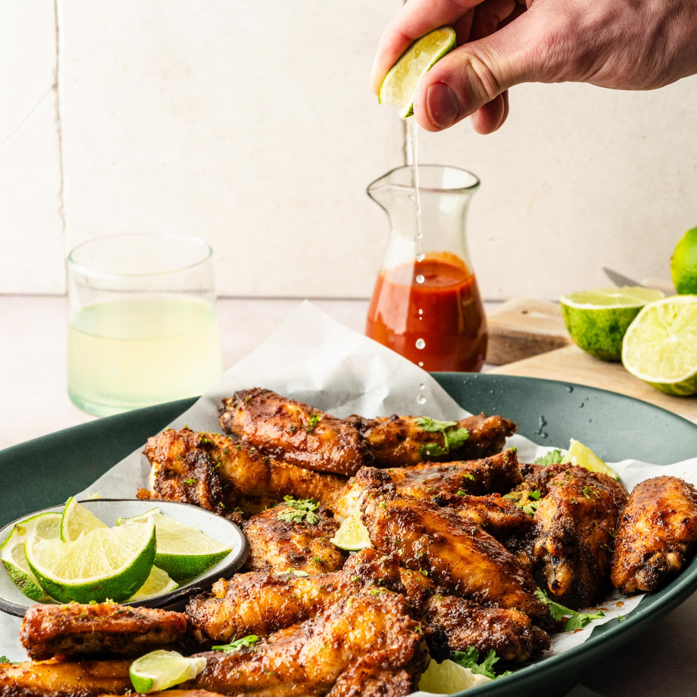 Simply Organic seasoning blended in a pot of chili, enhancing savory warmth