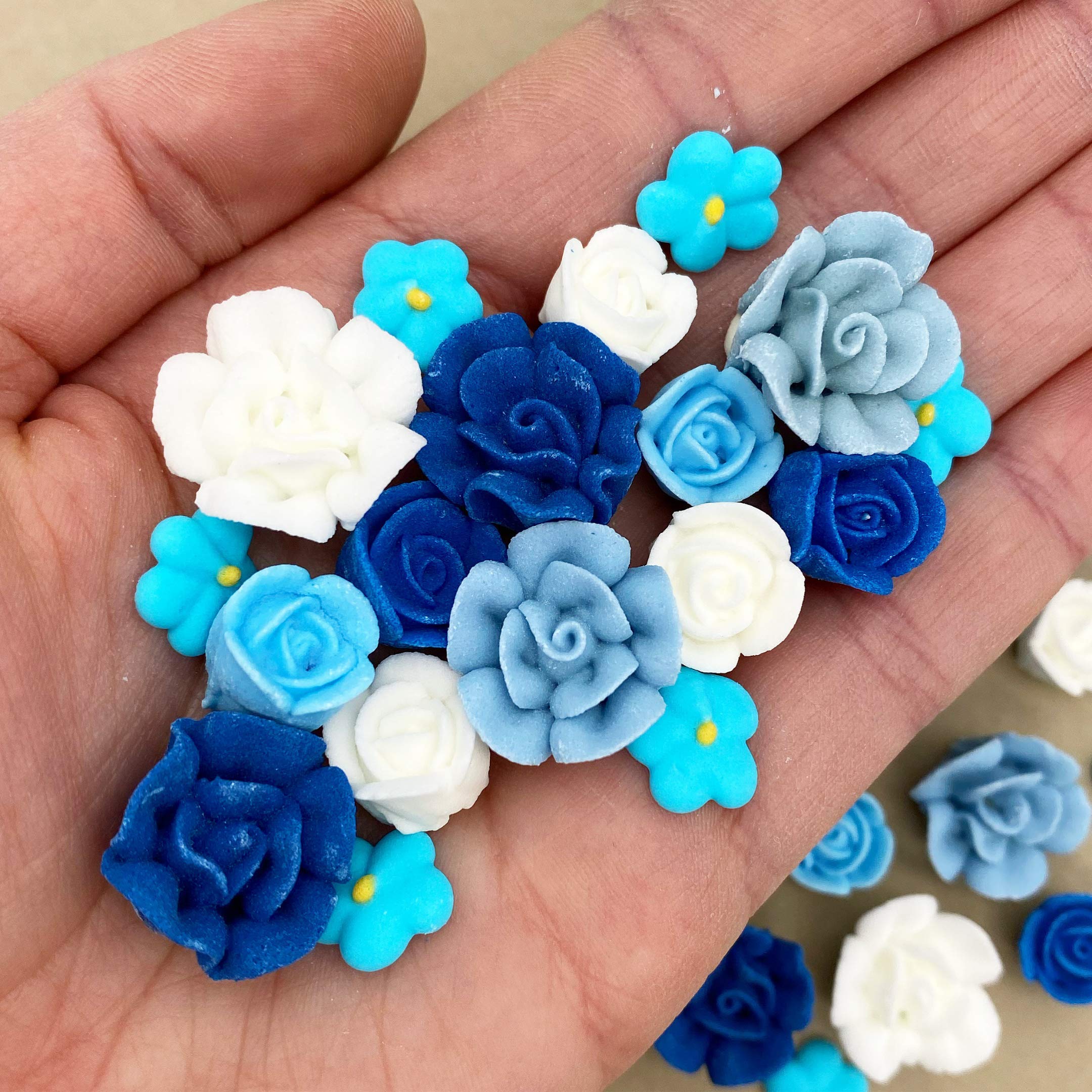 SIMPLY SUCRÉ close-up of petal texture on a blue-white royal icing flower — detailed realism