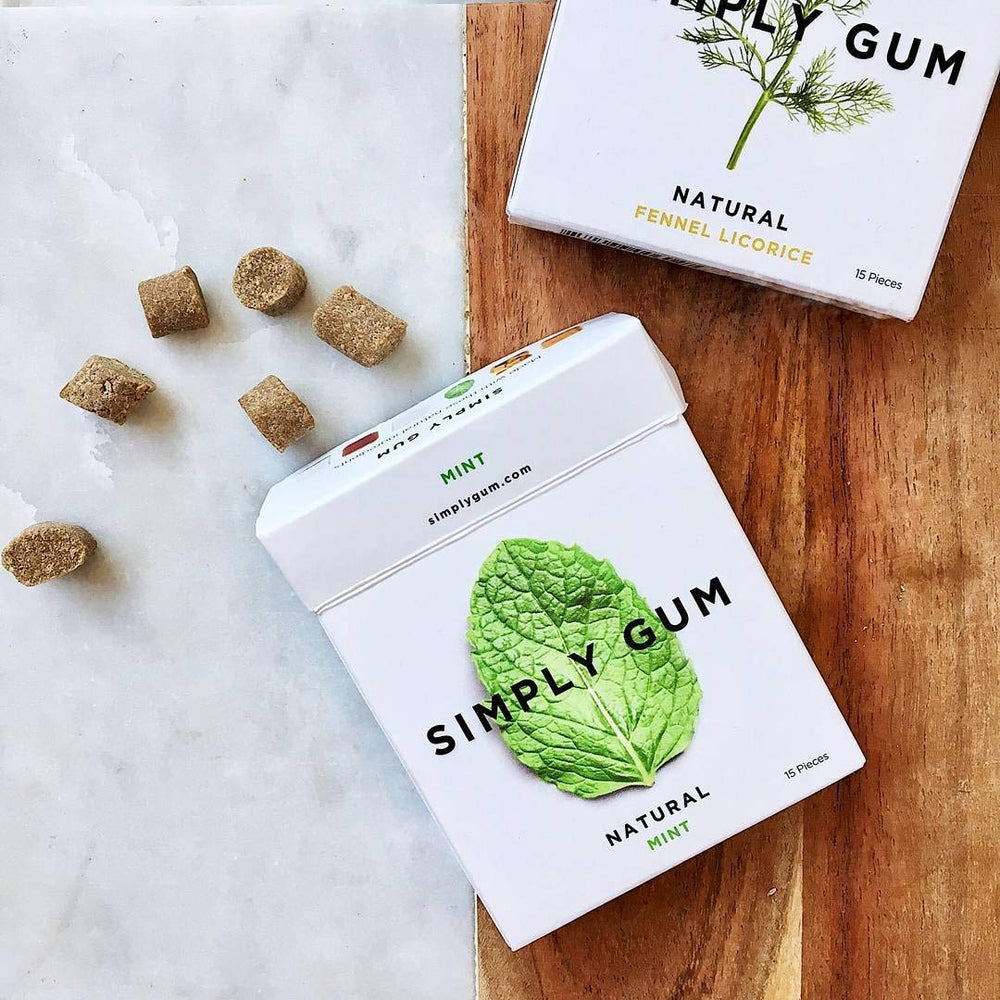 Simply Gum eco-friendly packaging laid out showing reduced plastic benefit