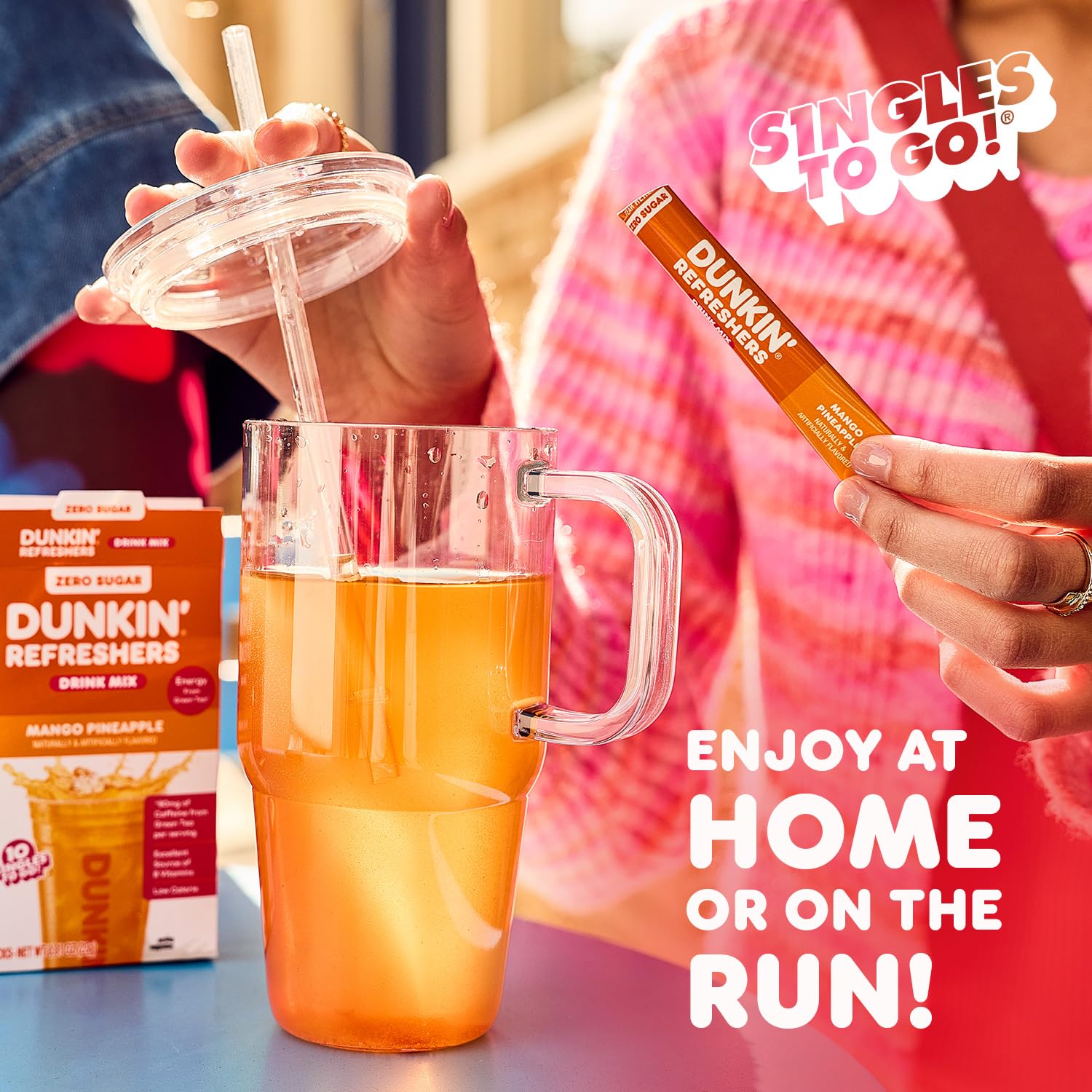 SINGLES TO GO! packet added to gym bottle showing portable energy boost