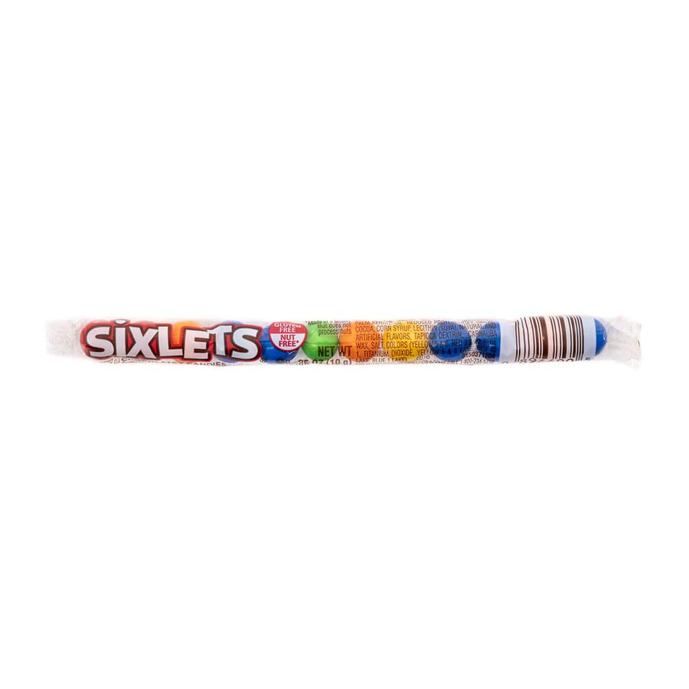 Sixlets on a party table with tubes as favors showing easy portioning benefit
