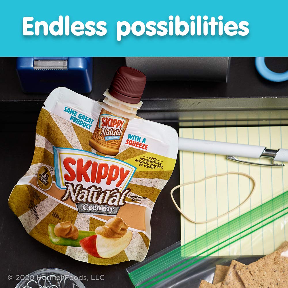 SKIPPY squeeze next to a hand to show compact 6oz size and portability