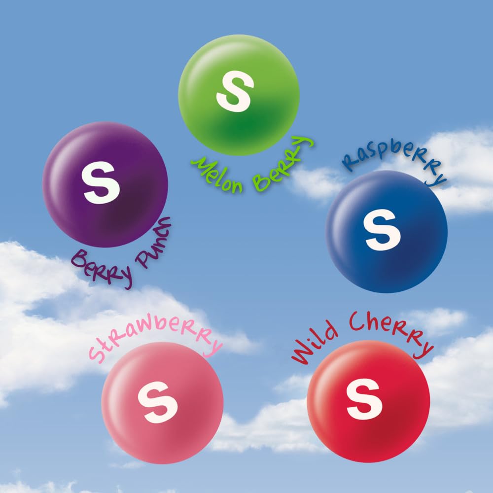 Skittles Wild Berry candies spread on surface highlighting mixed berry colors and bite-size pieces