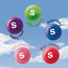 Skittles Wild Berry candies spread on surface highlighting mixed berry colors and bite-size pieces