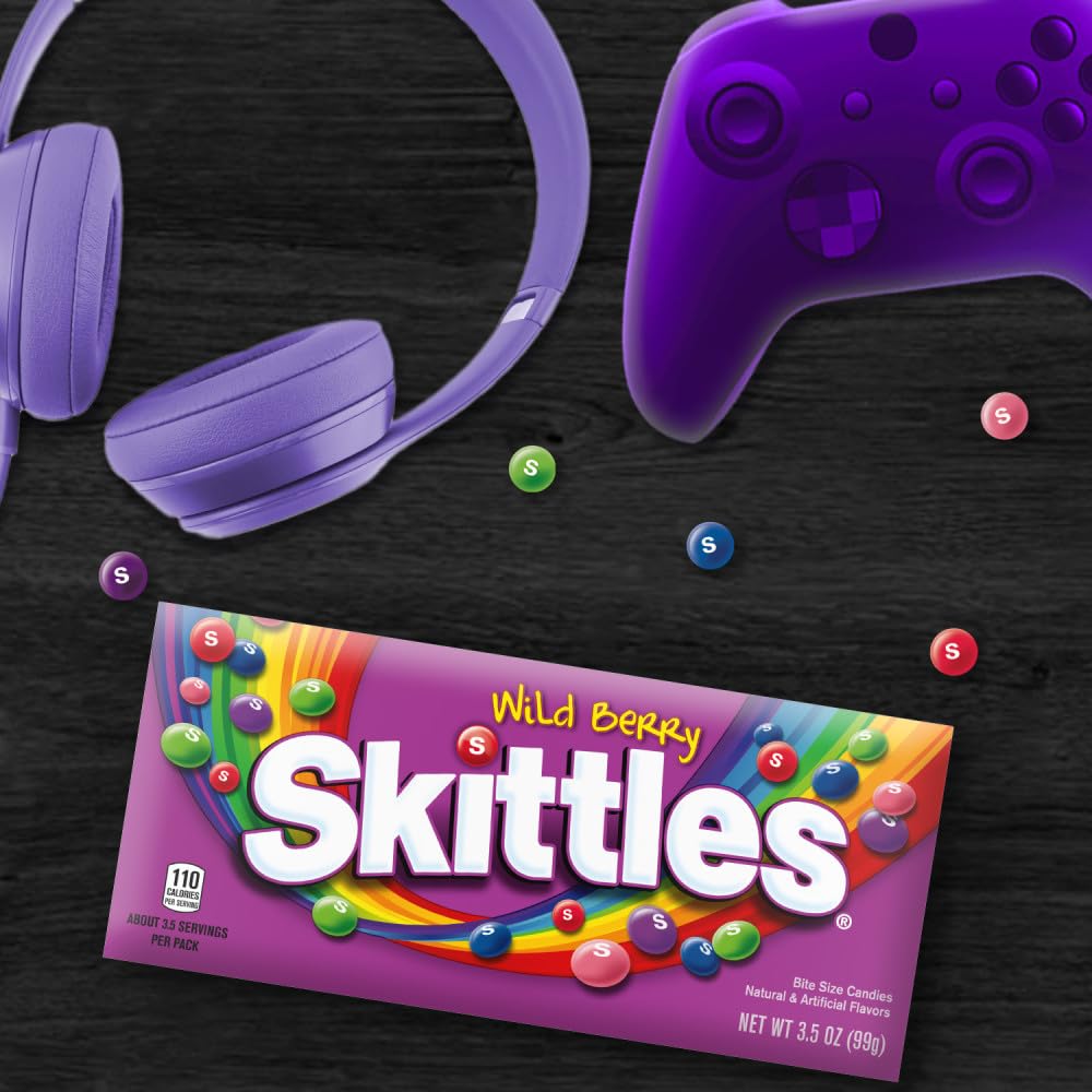 Skittles Wild Berry pouch beside a smartphone for scale illustrating portable serving size