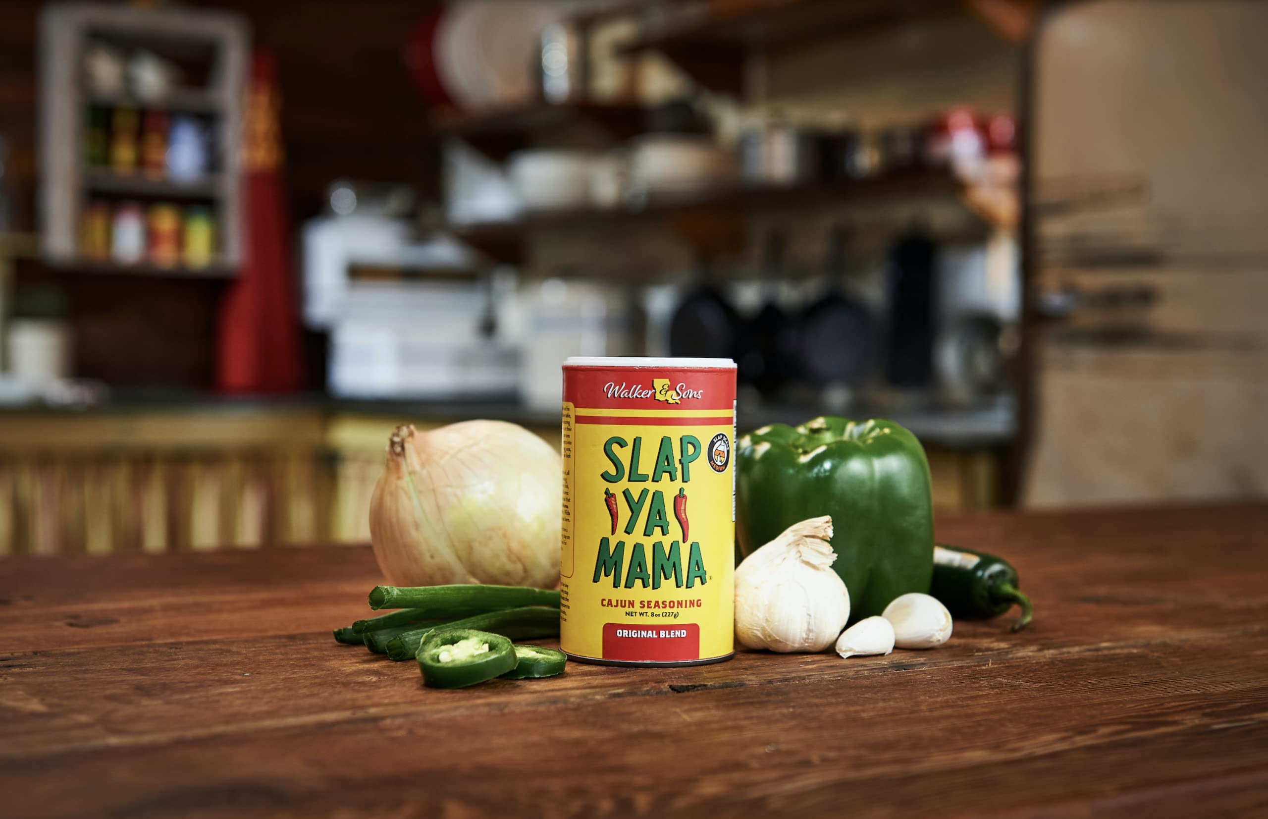 SLAP YA MAMA side-by-side size comparison of 8 oz can and 5 oz bottle for scale and portability