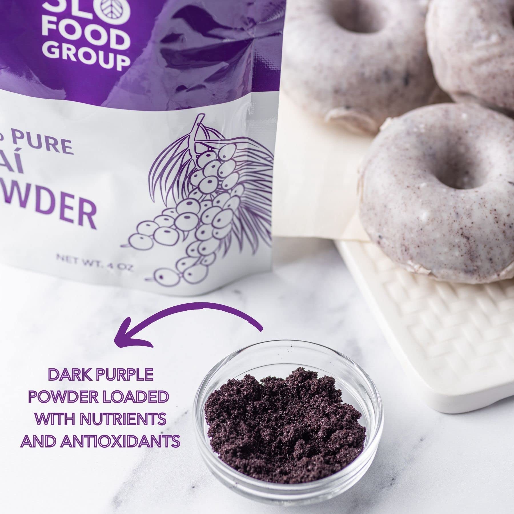 Slofoodgroup acai powder on countertop with smoothie glass illustrating easy use