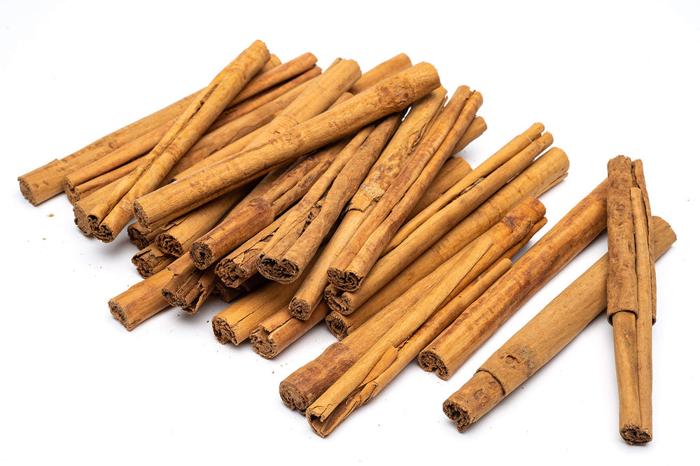 Slofoodgroup cinnamon sticks staged in kitchen setting showing everyday culinary use