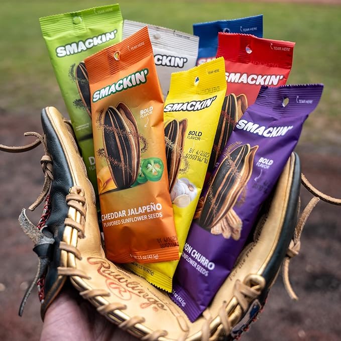 SMACKIN' bag held in hand to show 1.5oz size and portion control benefit