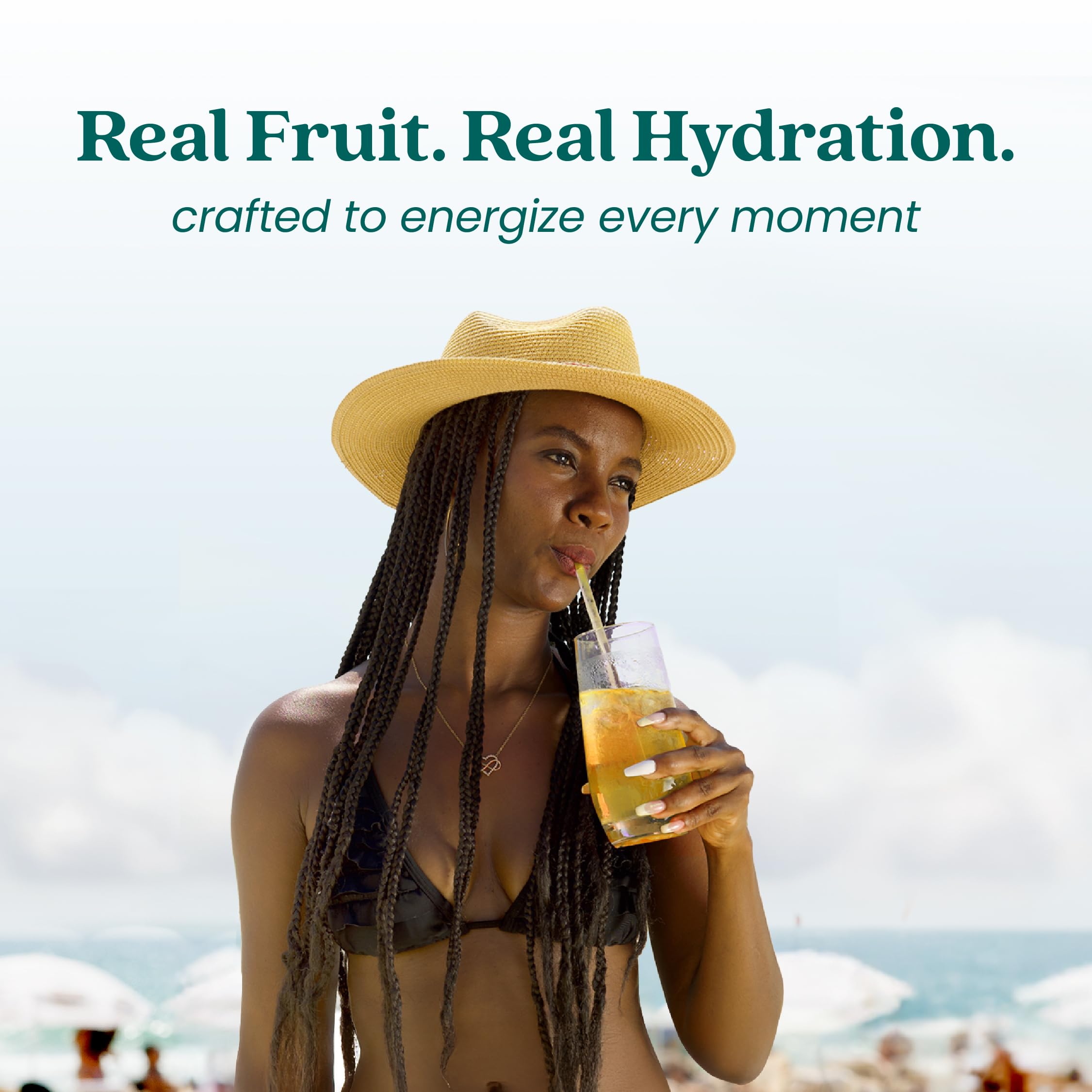 Smartfruit bottle beside a 12oz glass to show scale and yield per bottle