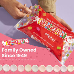 Individually wrapped Smarties rolls displayed for hygienic distribution and convenience