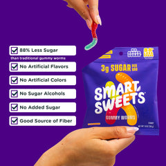 SmartSweets gummy worms scattered on surface showing variety and easy portion appeal