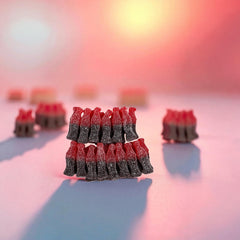 Smarty Stop bottle-shaped gummy detail emphasizing chewiness and playful shape