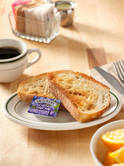 Smucker's close-up of grape jelly texture highlighting real fruit consistency