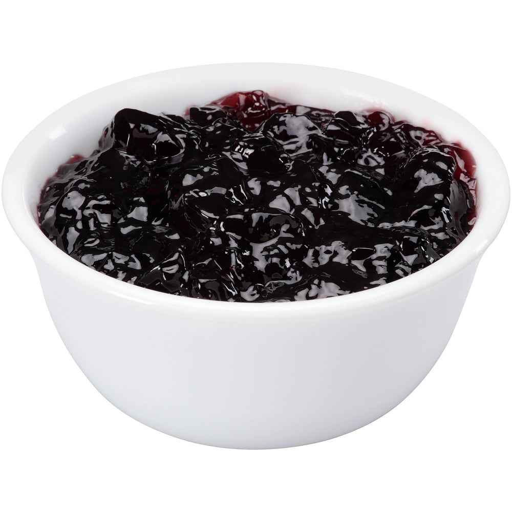 Smucker's jam cup interior close-up highlighting smooth texture and portion control