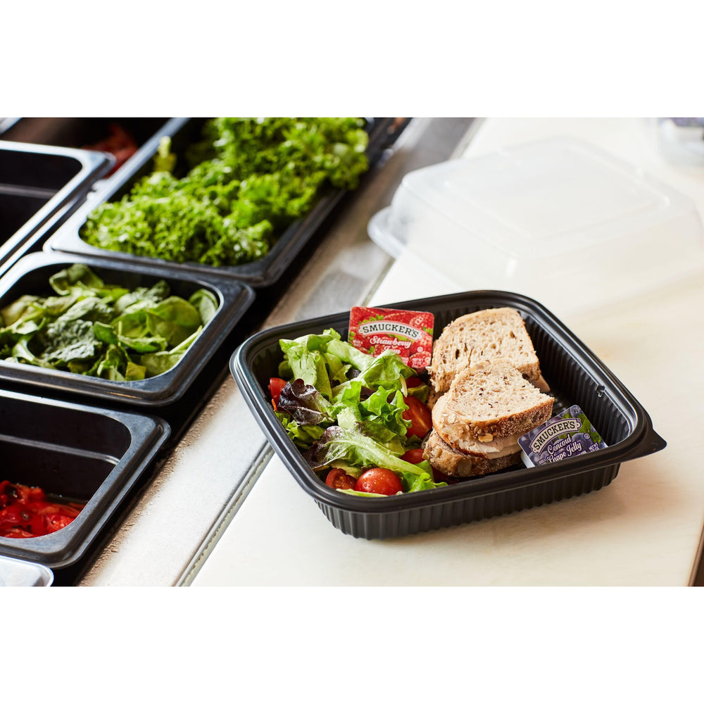 Smucker's cups arranged in tabletop caddy for neat service and easy grabbing
