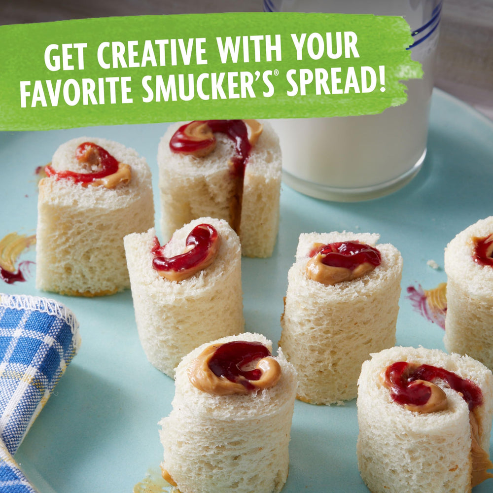 Smucker's portion cups arranged in a tabletop caddy for easy guest access