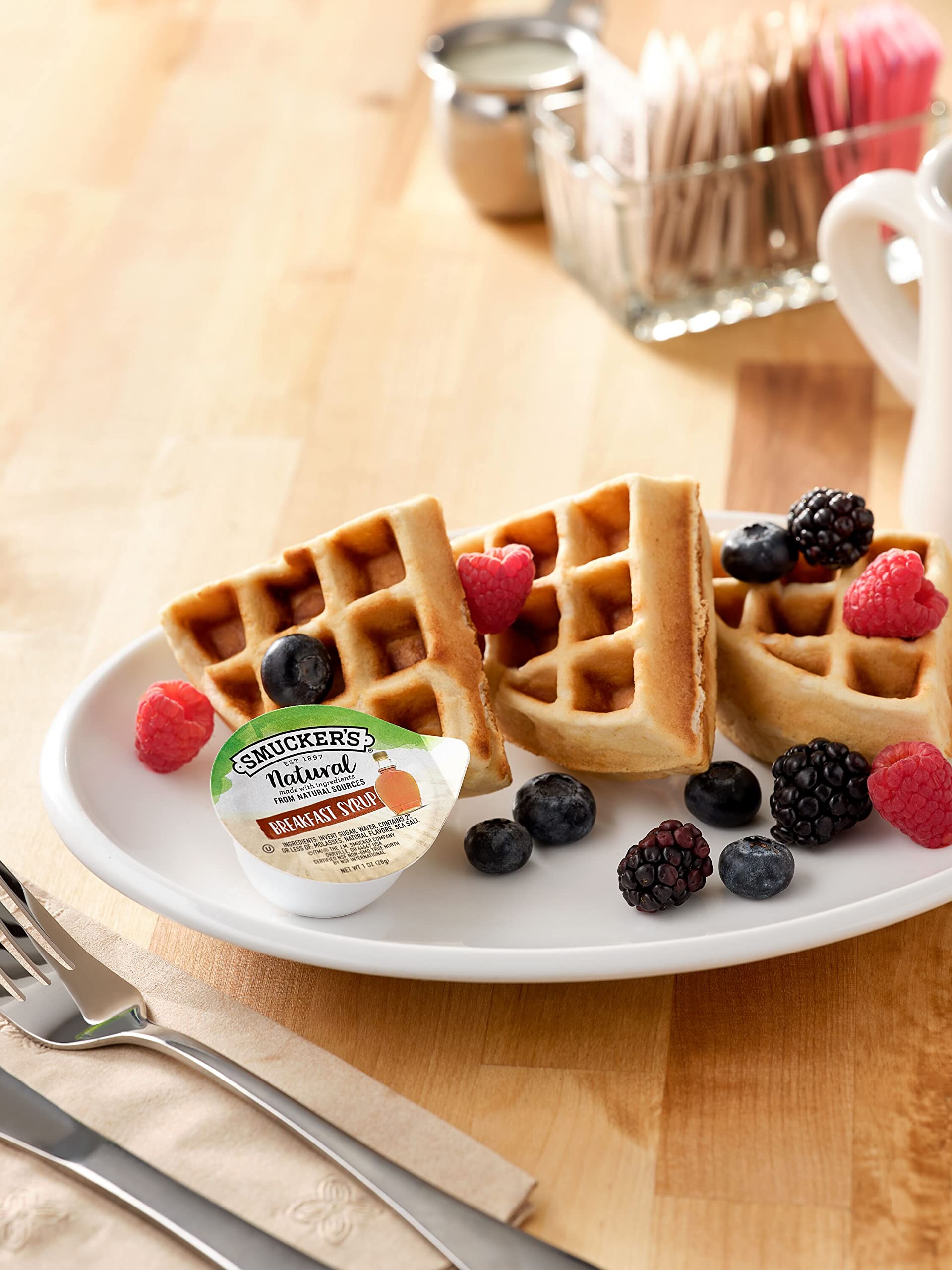 Smucker's syrup close-up pouring texture showing rich color and consistent portioning benefit