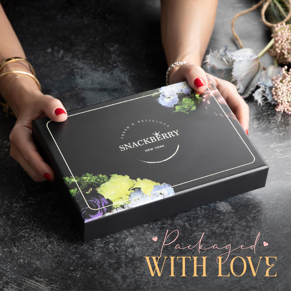 Snackberry open compartments revealing four sealed sections for easy sharing
