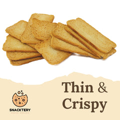 SNACKTERY opened stay-fresh packet with toasts, portable packs keep crunch