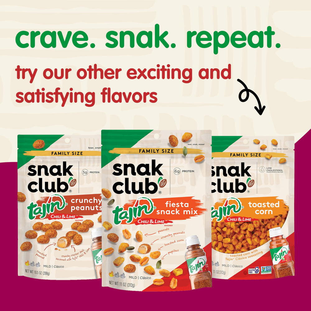 Snak Club snack bags on picnic blanket showing outdoor snacking convenience