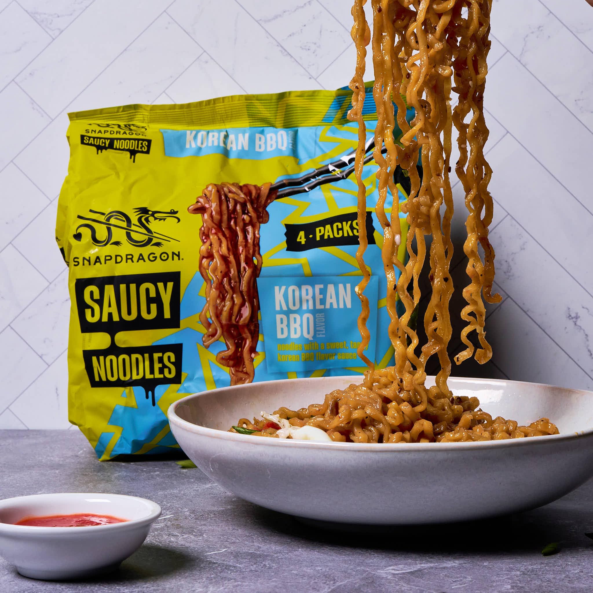 Snapdragon noodles on a desk lunch setting showing quick meal convenience benefit
