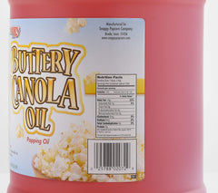 SNAPPY oil being poured into popcorn machine for even coating and easy pouring