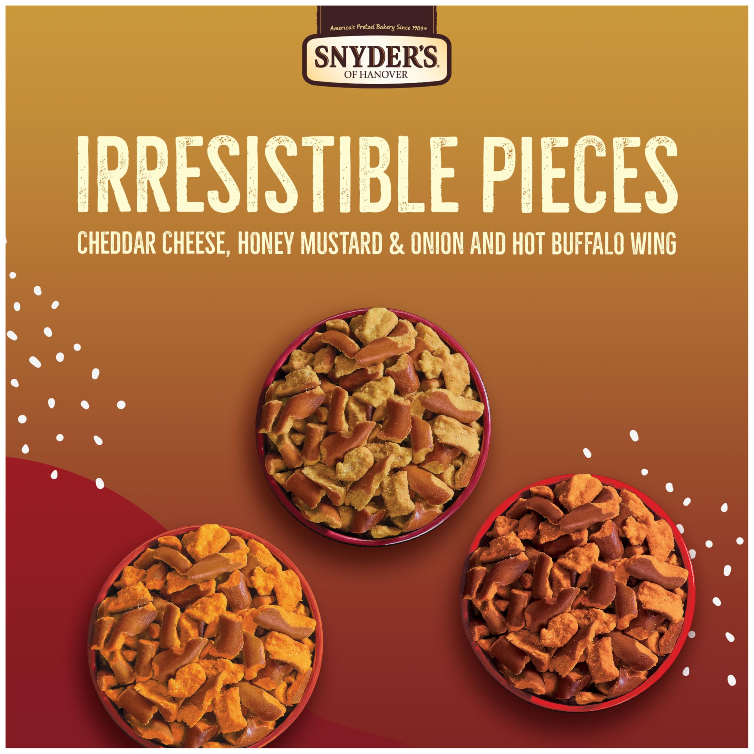 Snyder's of Hanover Cheddar Cheese bag detail showing cheesy coating for satisfying crunch