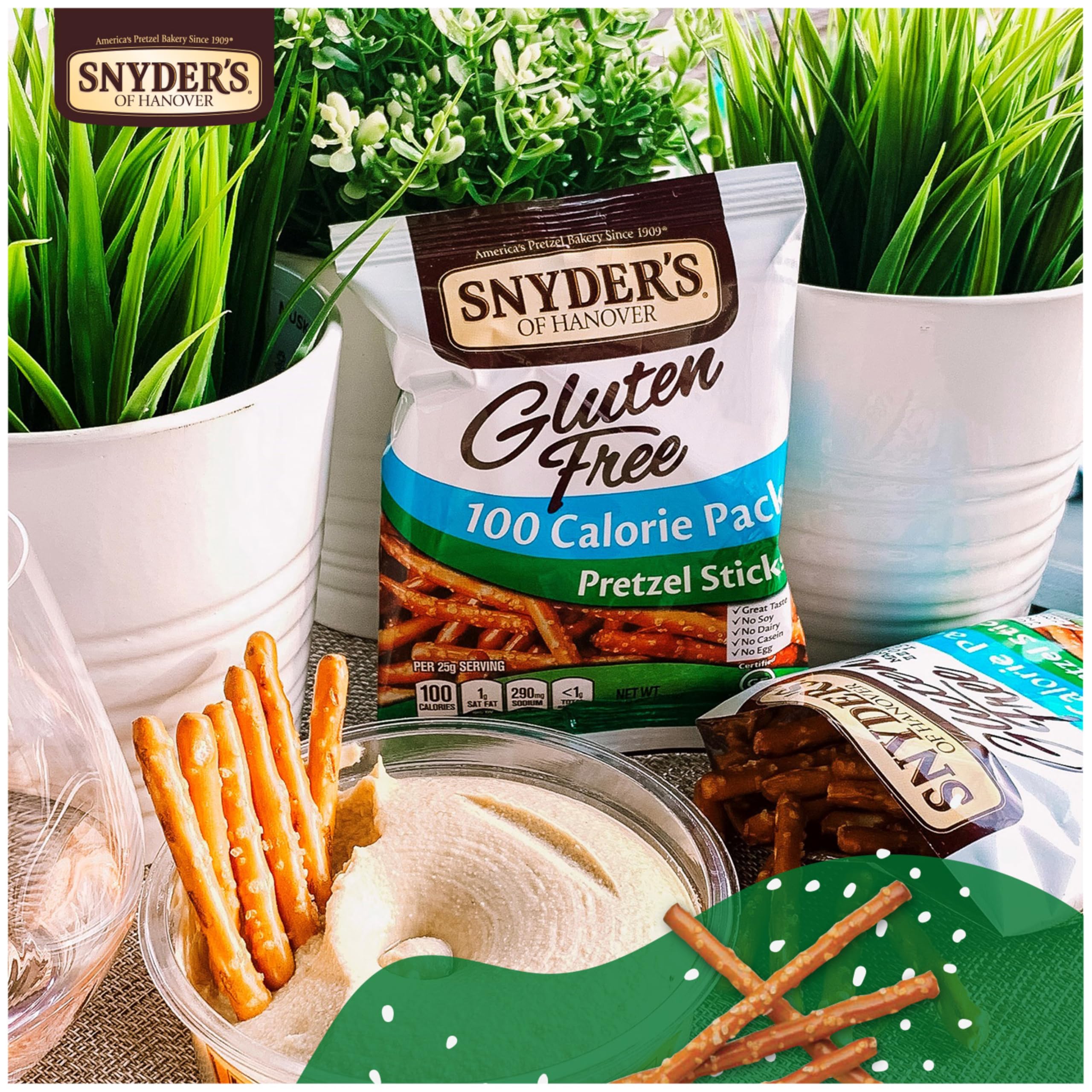 Snyder's of Hanover pretzel sticks dipped in hummus for tasty pairing