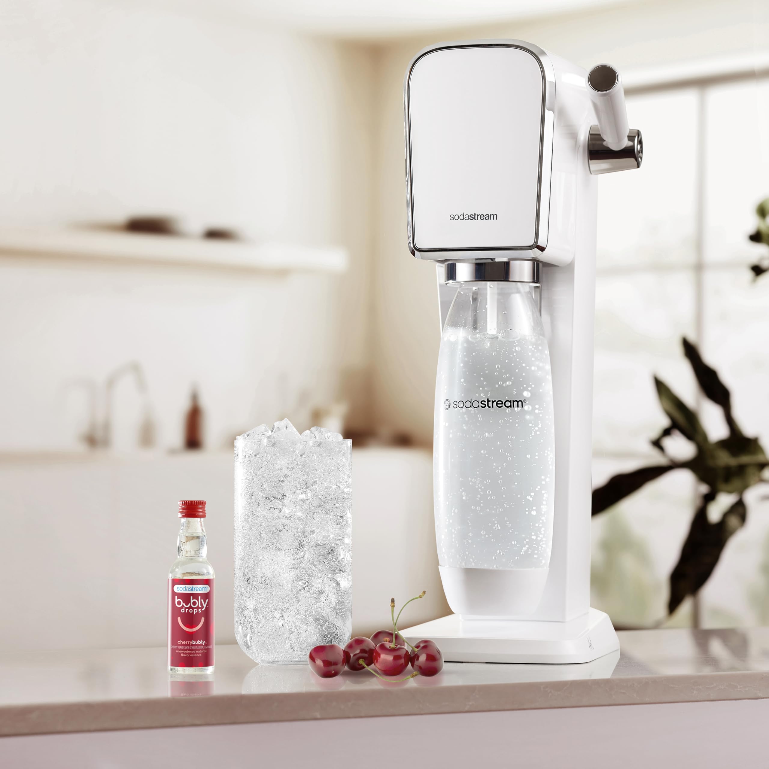 sodastream bubly Drops Cherry next to a glass for scale showing compact 40ml bottle