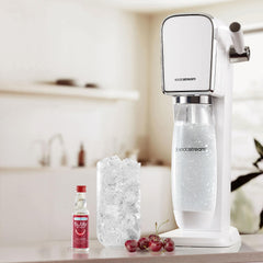 sodastream bubly Drops lime dropping into a glass to flavor sparkling water quickly