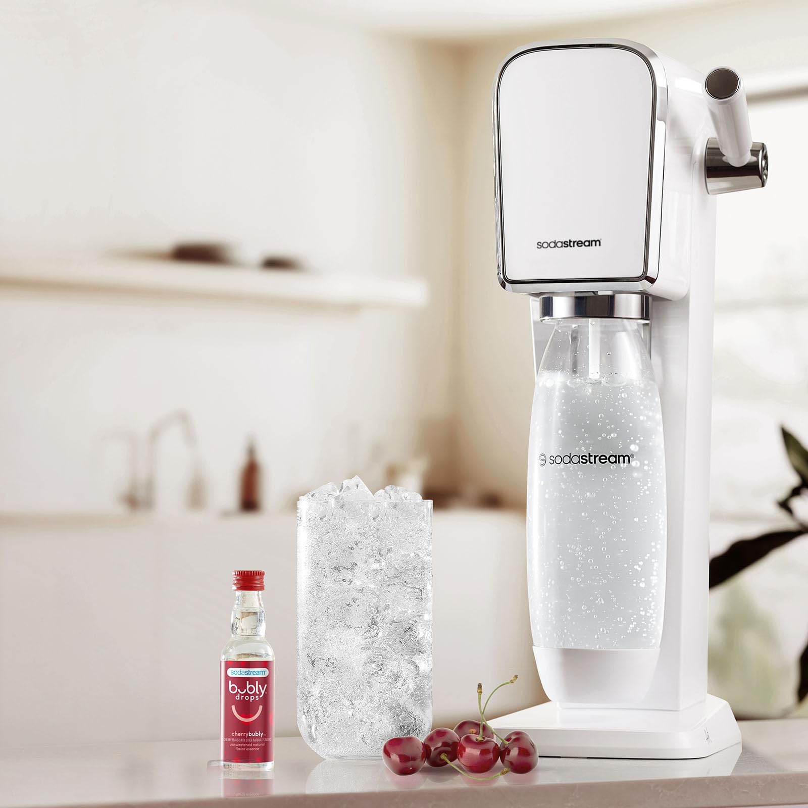 sodastream bubly Drops raspberry being added to sparkling water for quick flavor