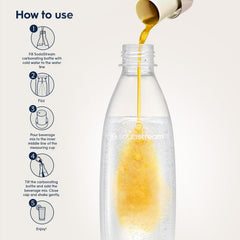 sodastream pouring diet tonic into a glass of carbonated water for customizable flavor