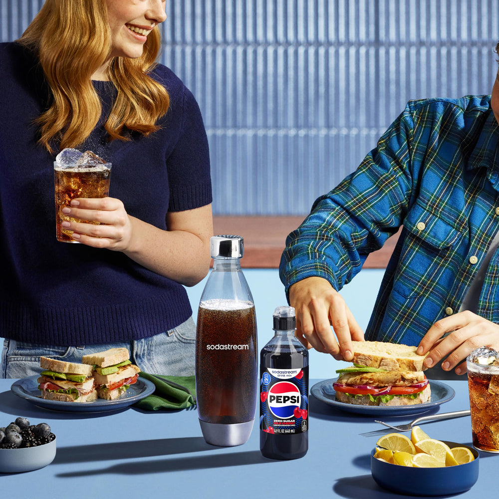 sodastream lifestyle kitchen setting showing variety pack ready for entertaining