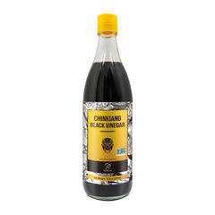 Soeos pouring dark vinegar close-up showing rich color and texture benefit
