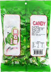 Soeos close-up of a guava candy piece with glossy texture, highlights fruity ripeness