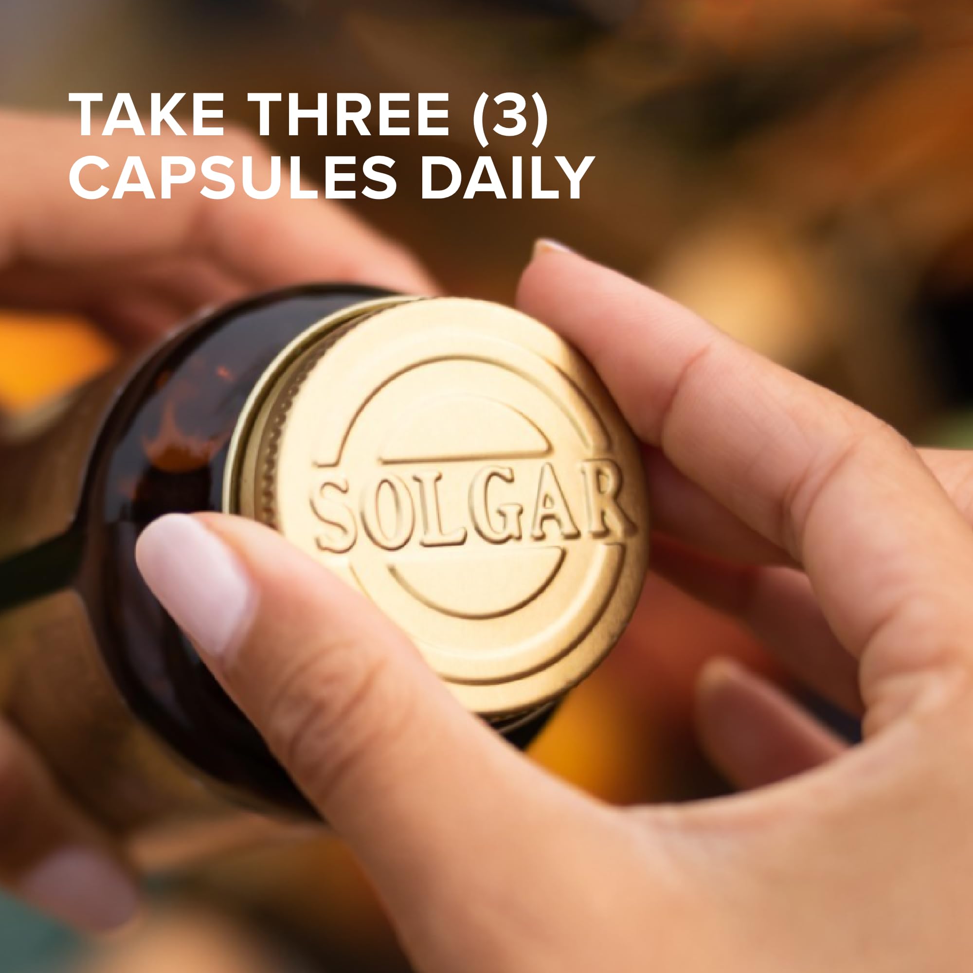 Solgar capsules in hand illustrating dosage size and practical portioning on the go