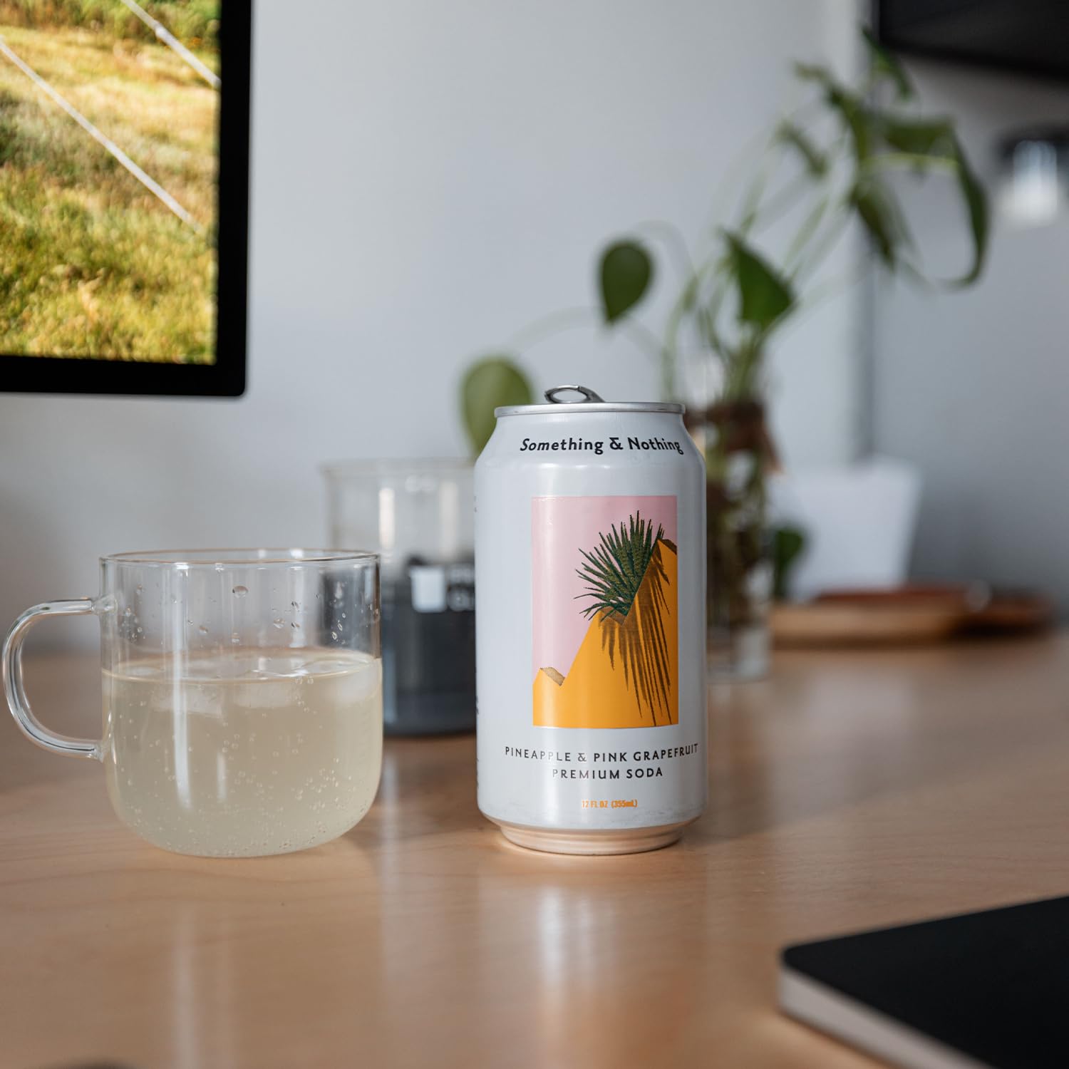 Something & Nothing recyclable cans stacked to show eco-friendly packaging and easy recycling