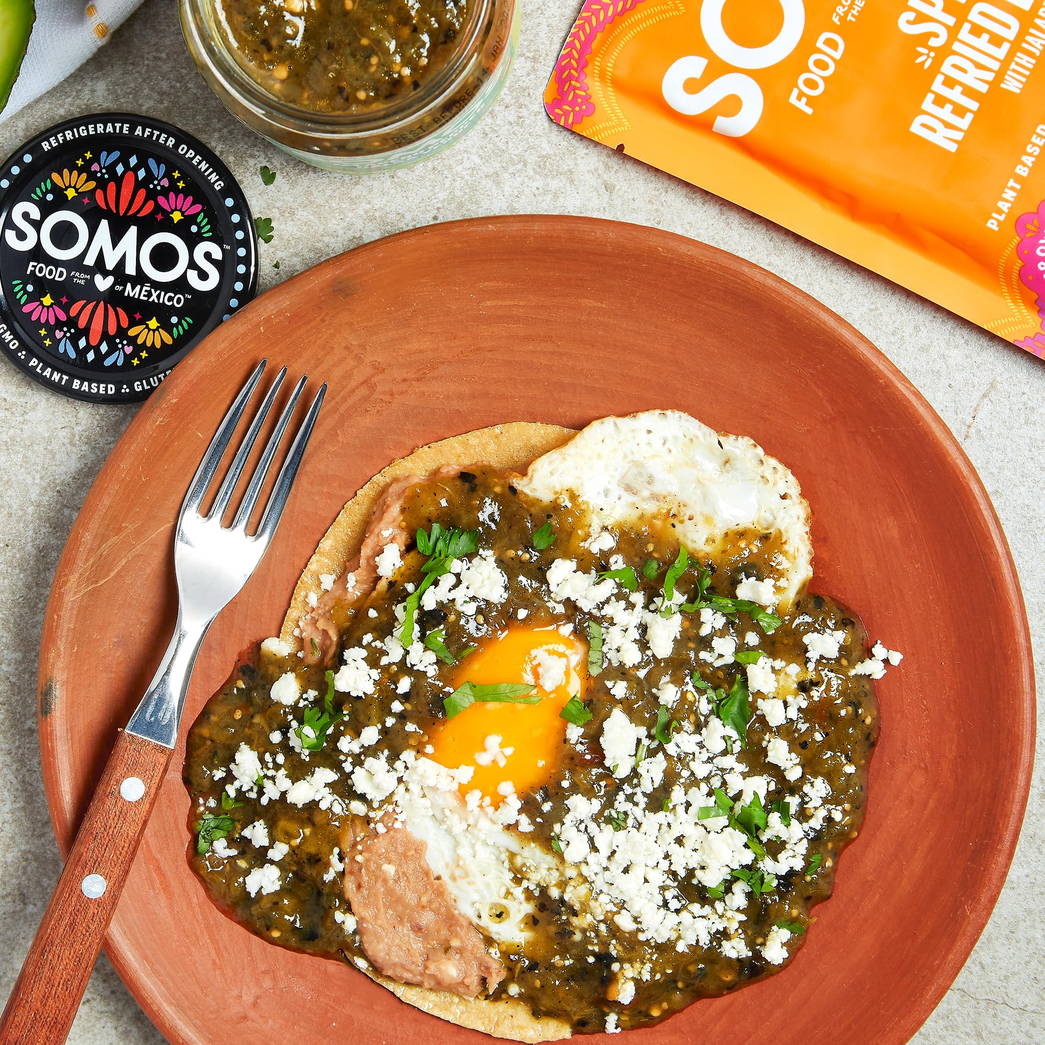 SOMOS label detail showing gluten-free vegan non-GMO icons, clear ingredient assurance